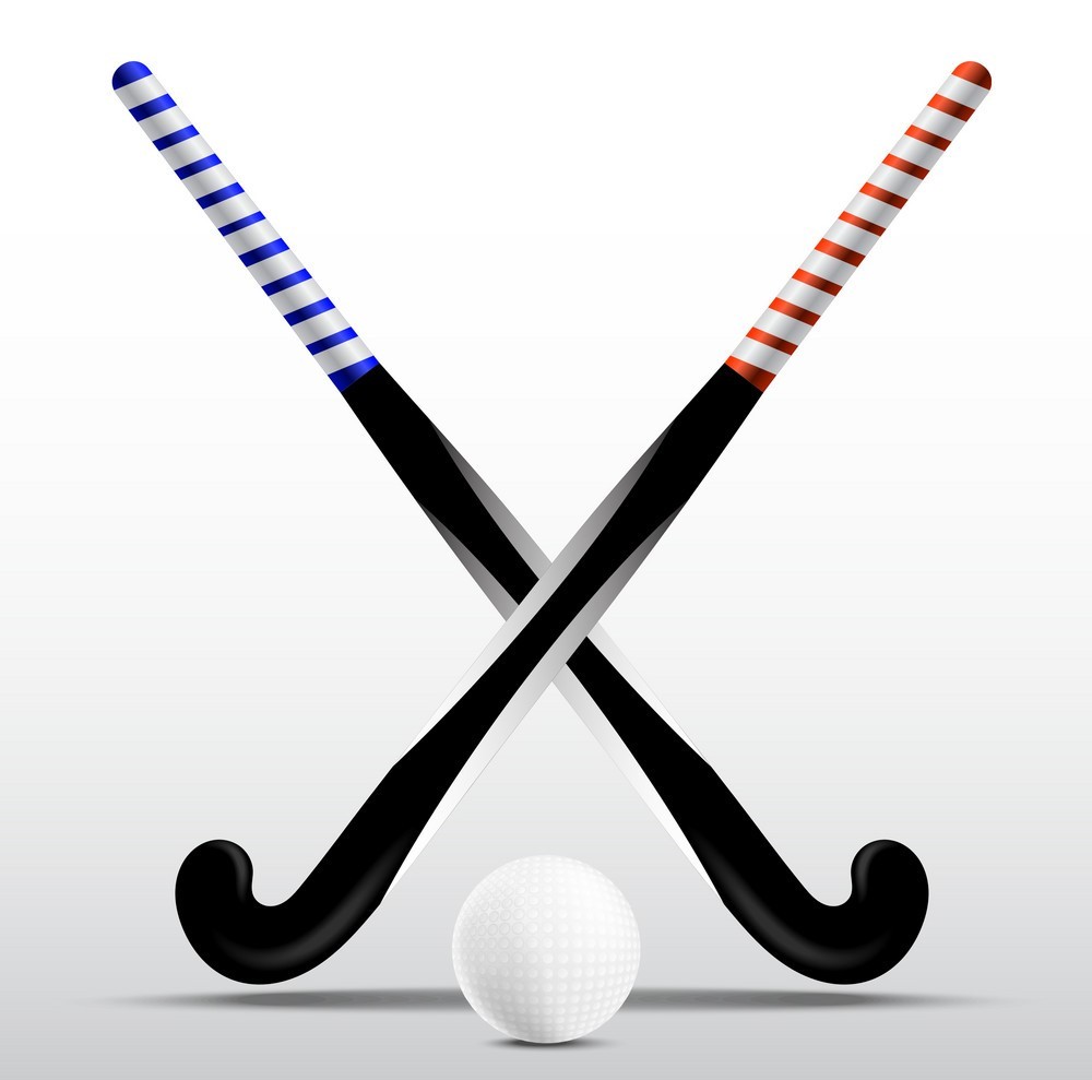 Two sticks for field hockey and ball